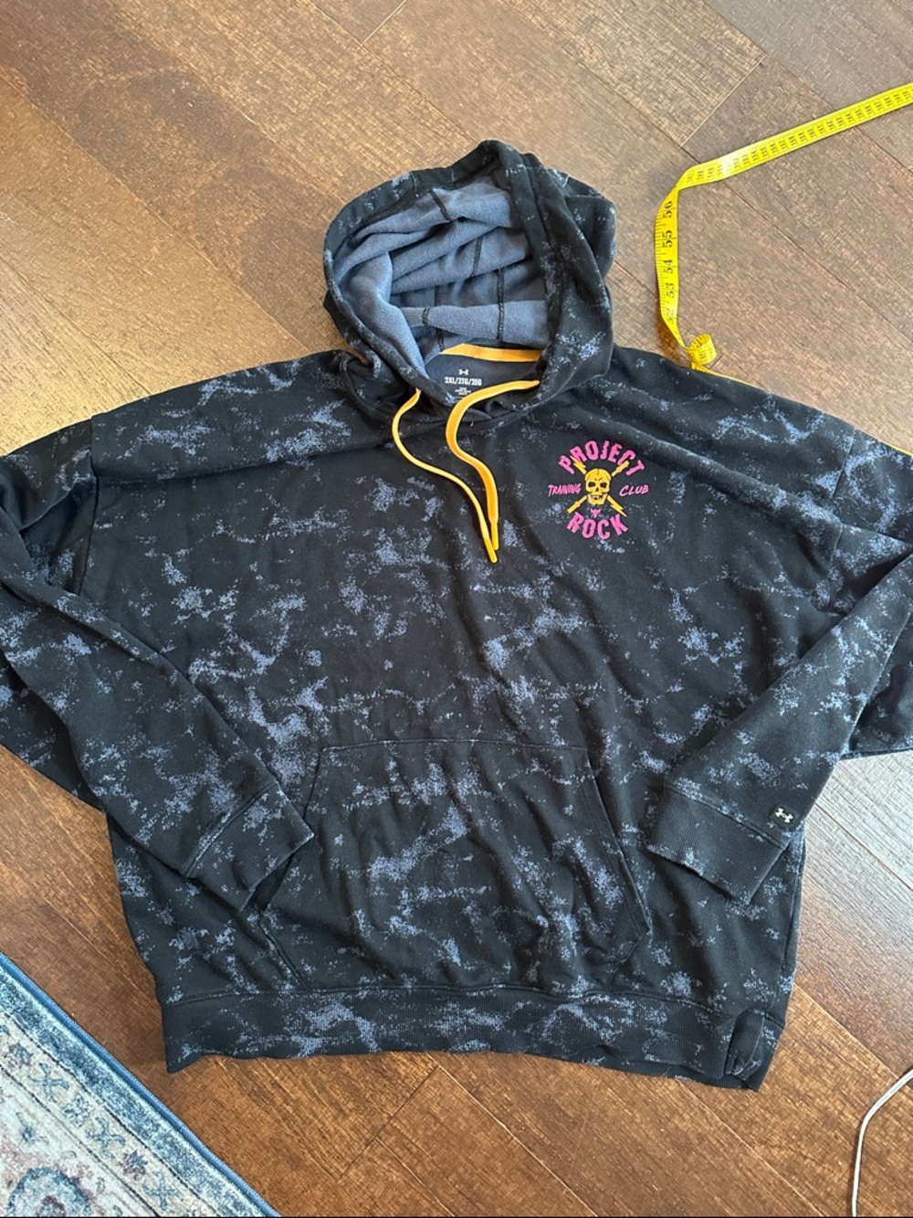 Under Armour Black Tie-Dye Hoodie with Yellow Drawstrings and Pink Skull Emblem